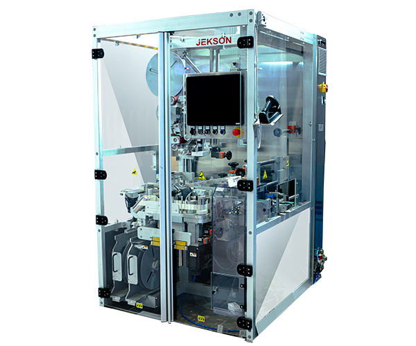 ST250 pharma-grade serialization and tamper-evident labeling machine with enclosed design, touchscreen interface, and compact high-speed conveyor system.